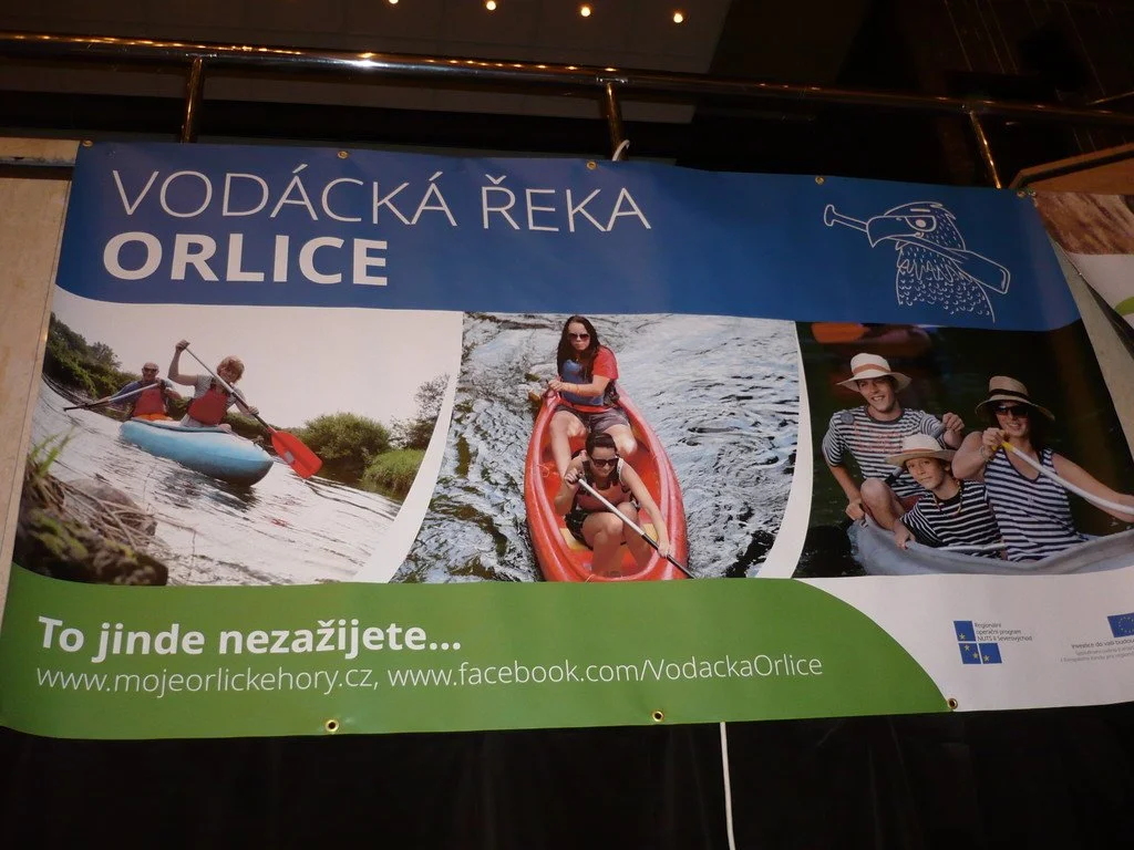 Banner Vodácká řeka Orlice s fotografiemi kanoistů na řece
