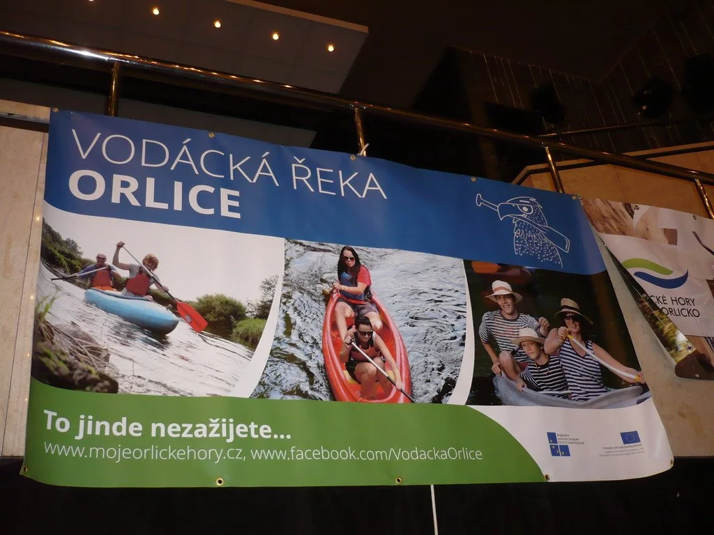 Banner Vodácká řeka Orlice s fotografiemi vodáků na kánoích